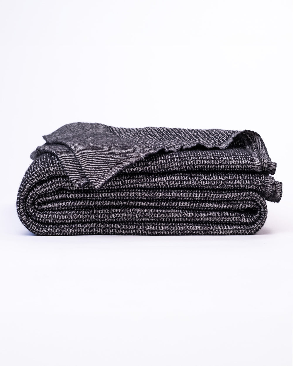 The Micro Waffle Wool Blanket in Charcoal
