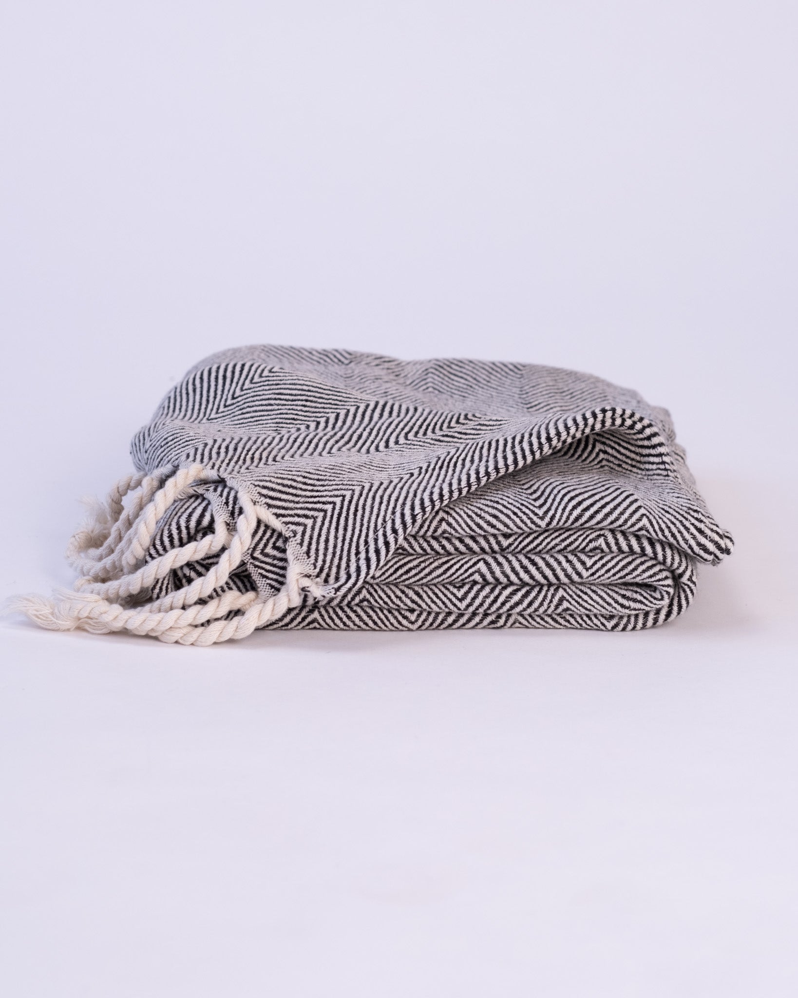 The Linen Herringbone Throw in Charcoal