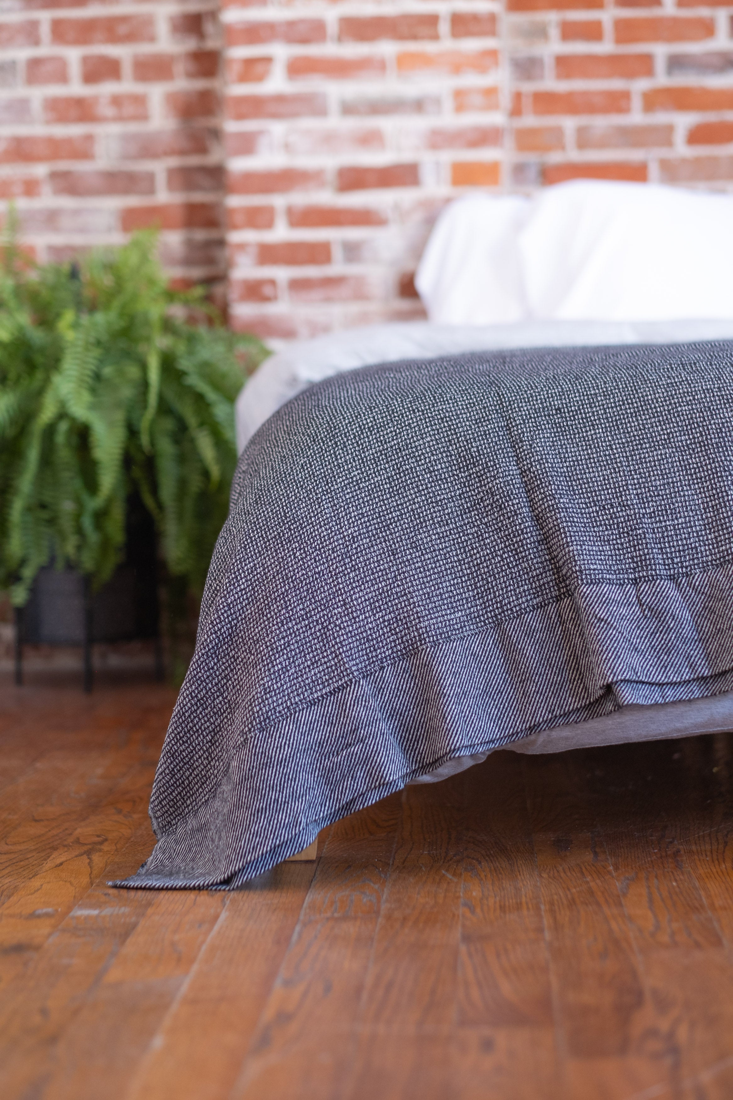 The Micro Waffle Wool Blanket in Charcoal