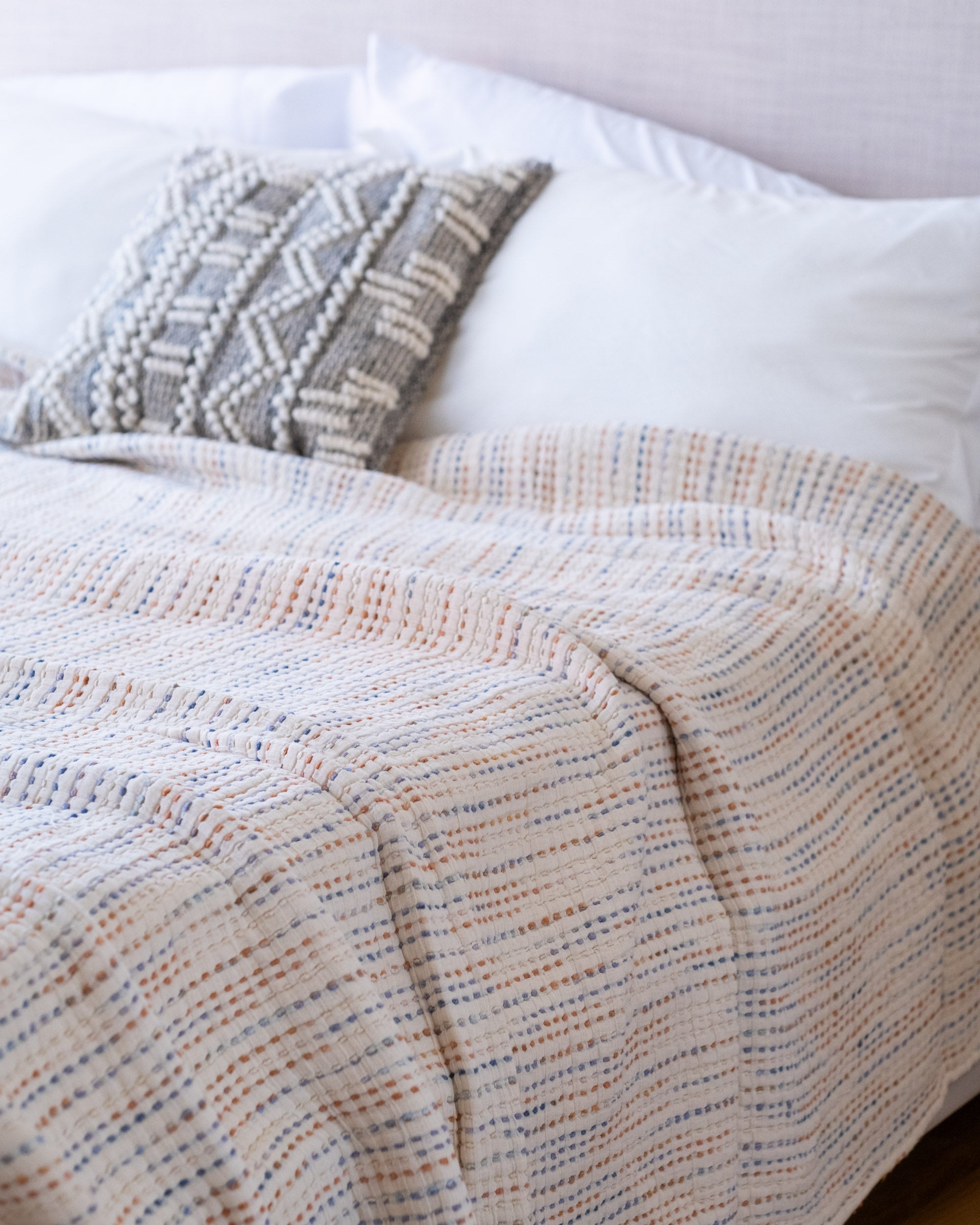 The Stitched Cotton Quilt in Rainbow