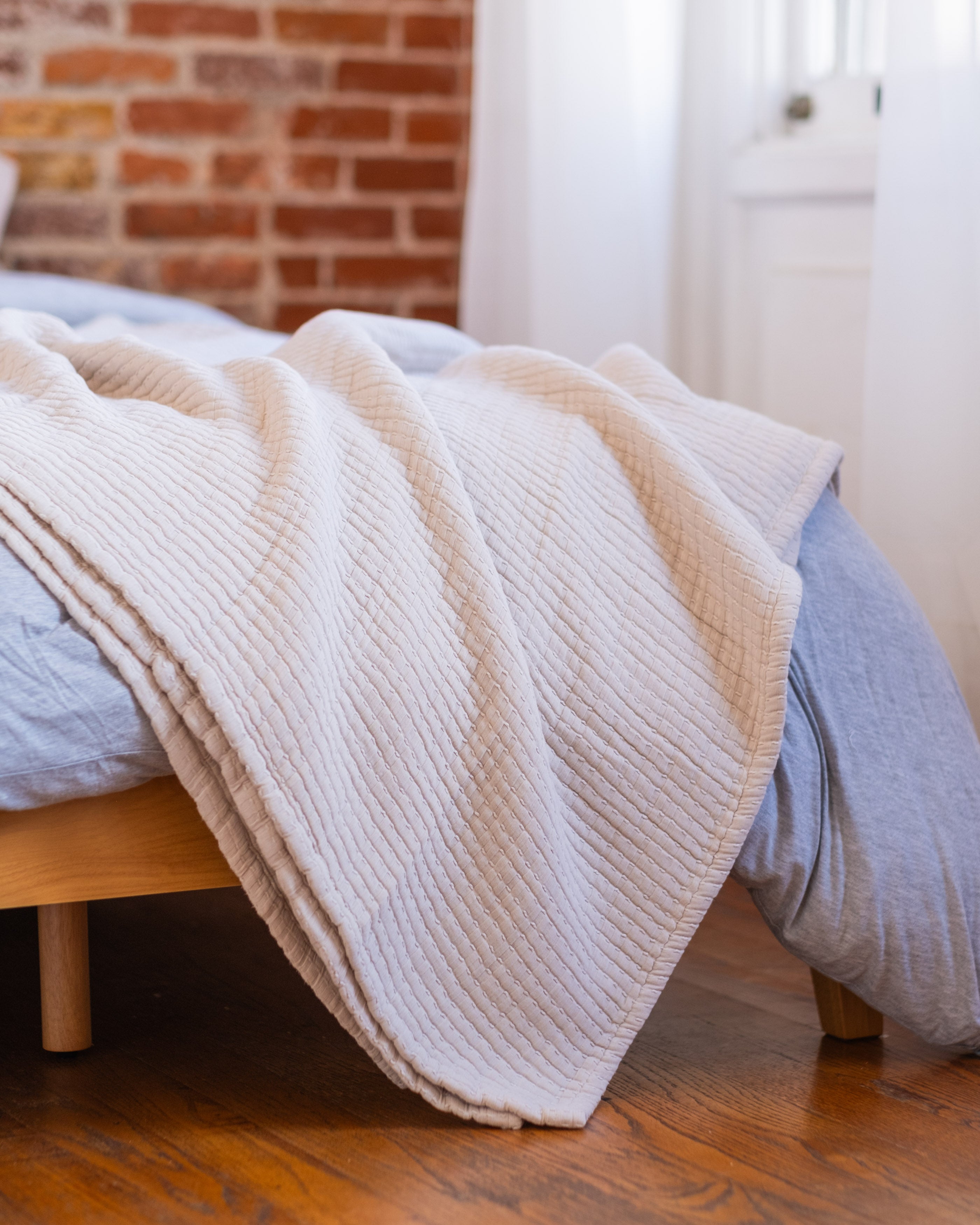 The Stitched Cotton Quilt in Bone