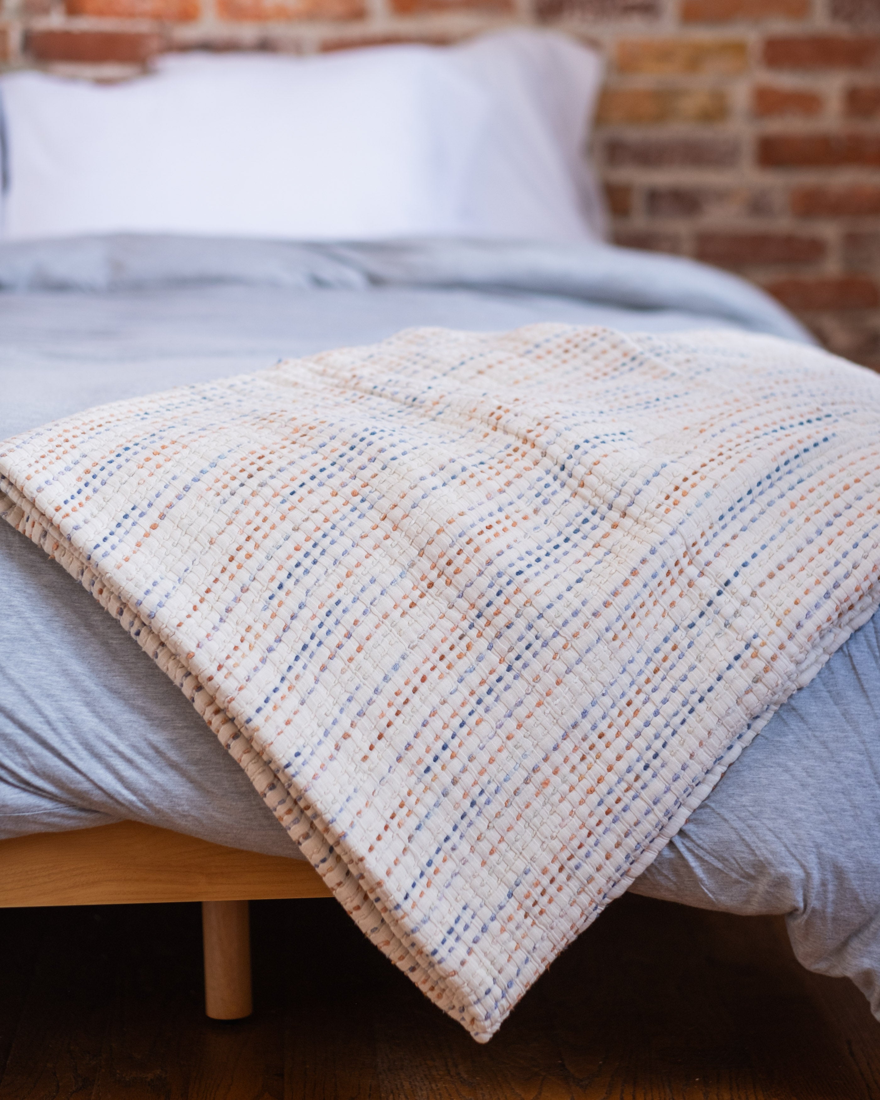 The Stitched Cotton Quilt in Rainbow