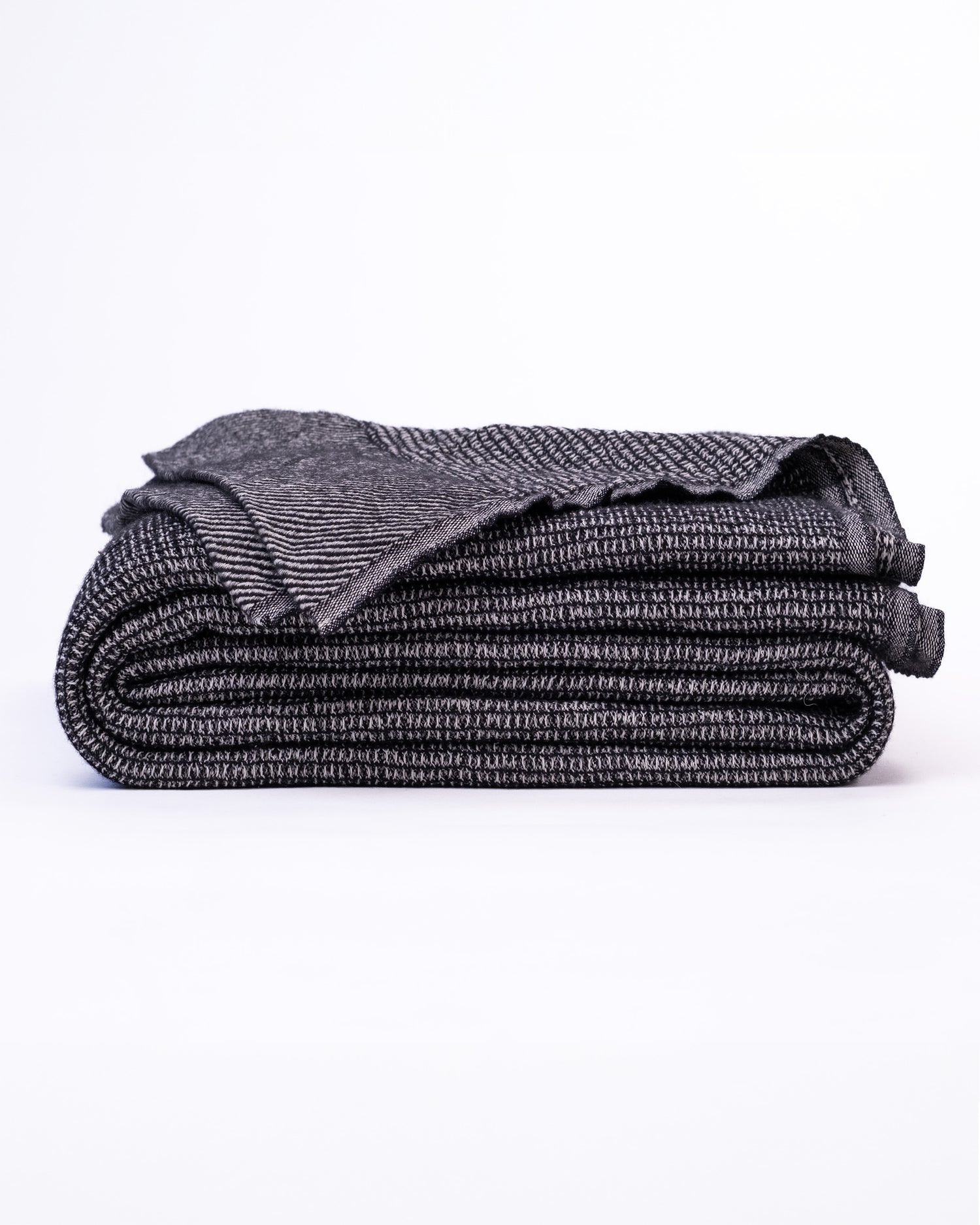 The Micro Waffle Wool Blanket in Charcoal