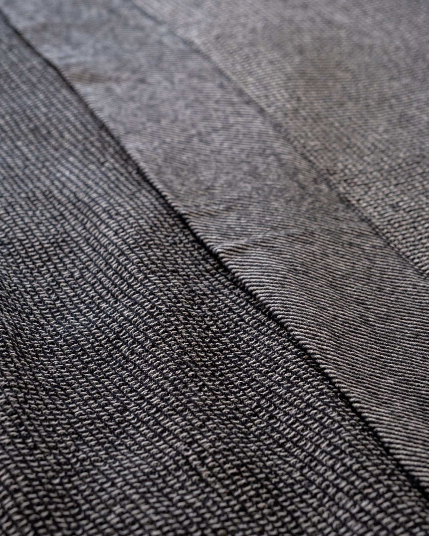 The Micro Waffle Wool Blanket in Charcoal