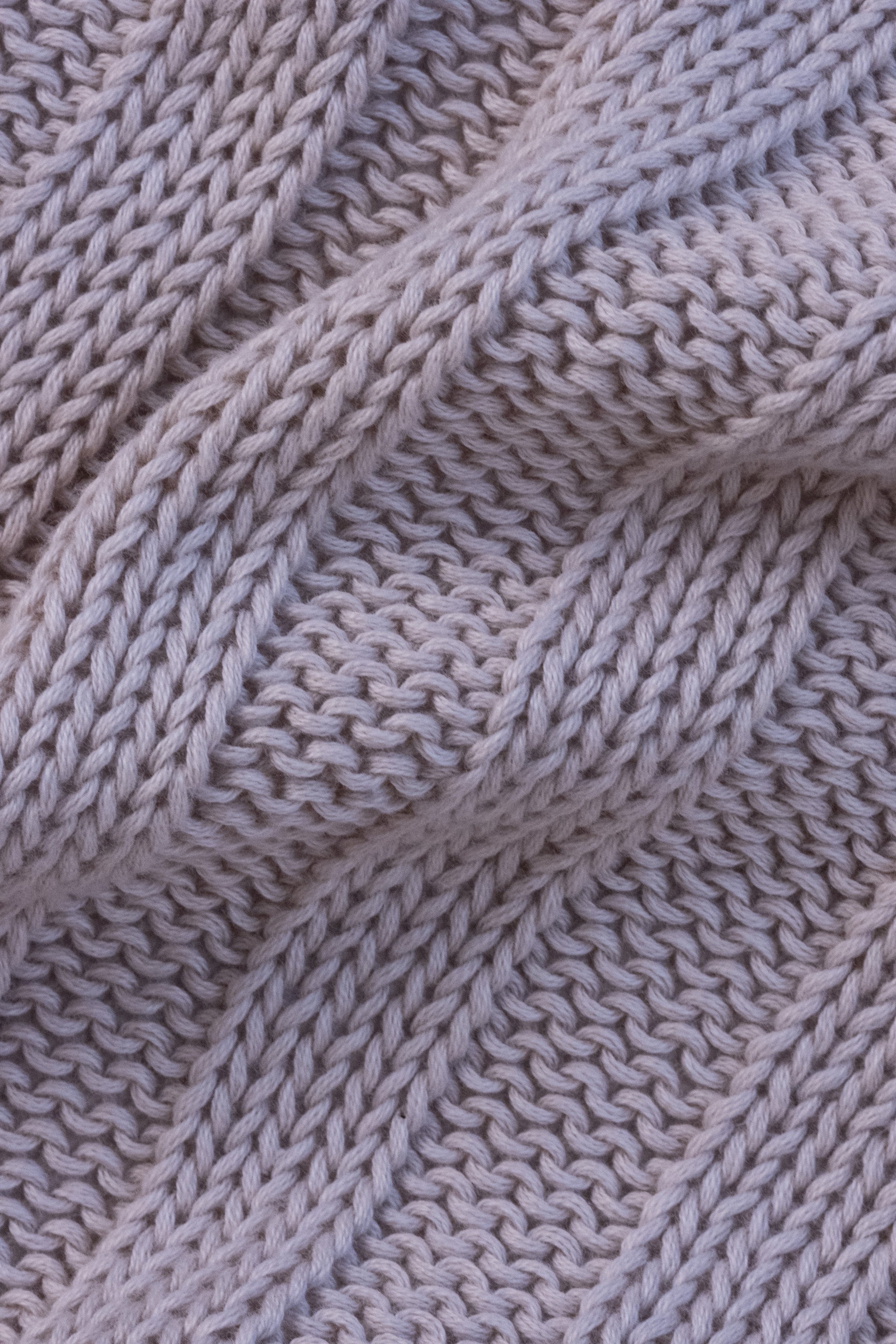The Rib Knit Throw in Bone