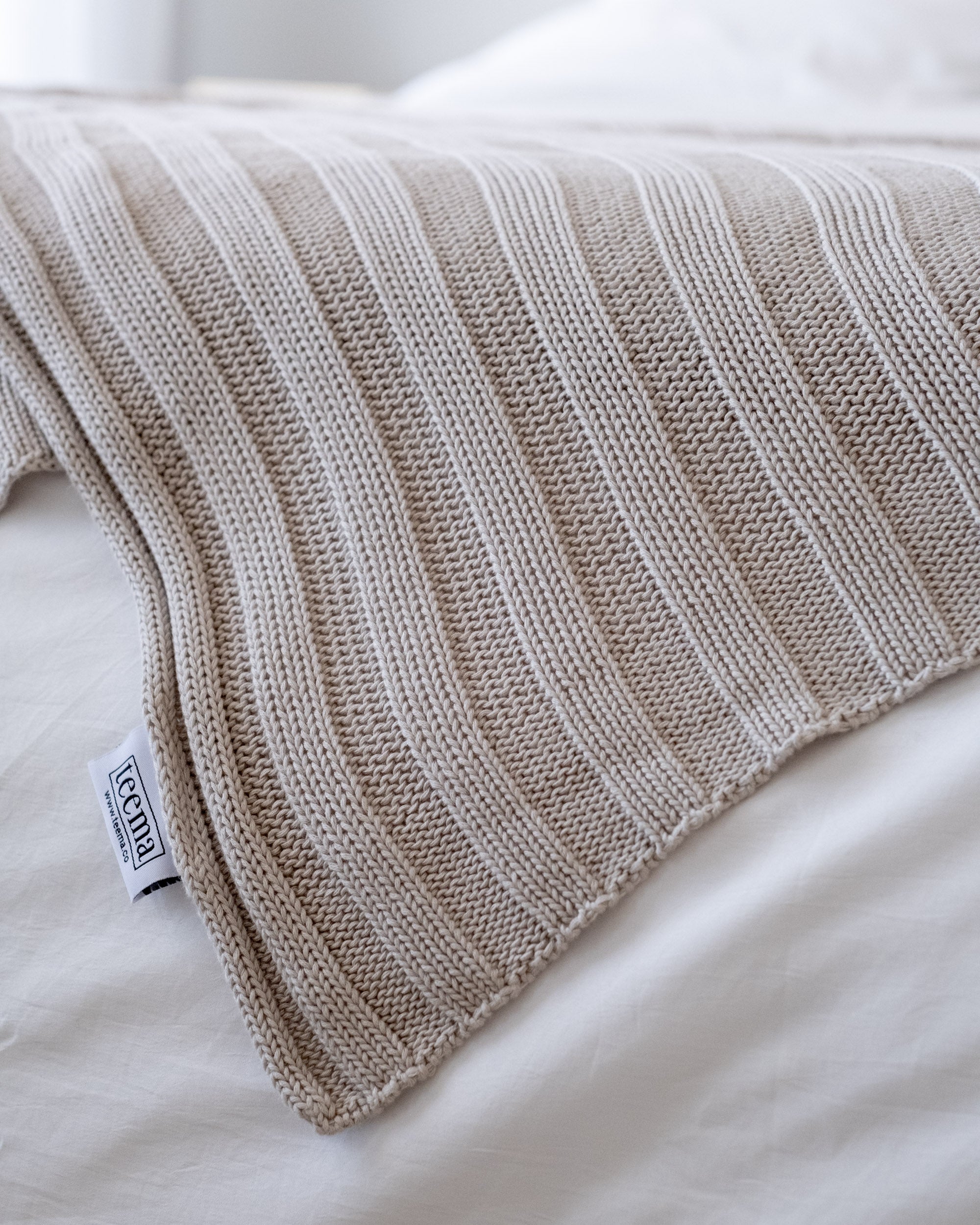 The Rib Knit Throw in Bone